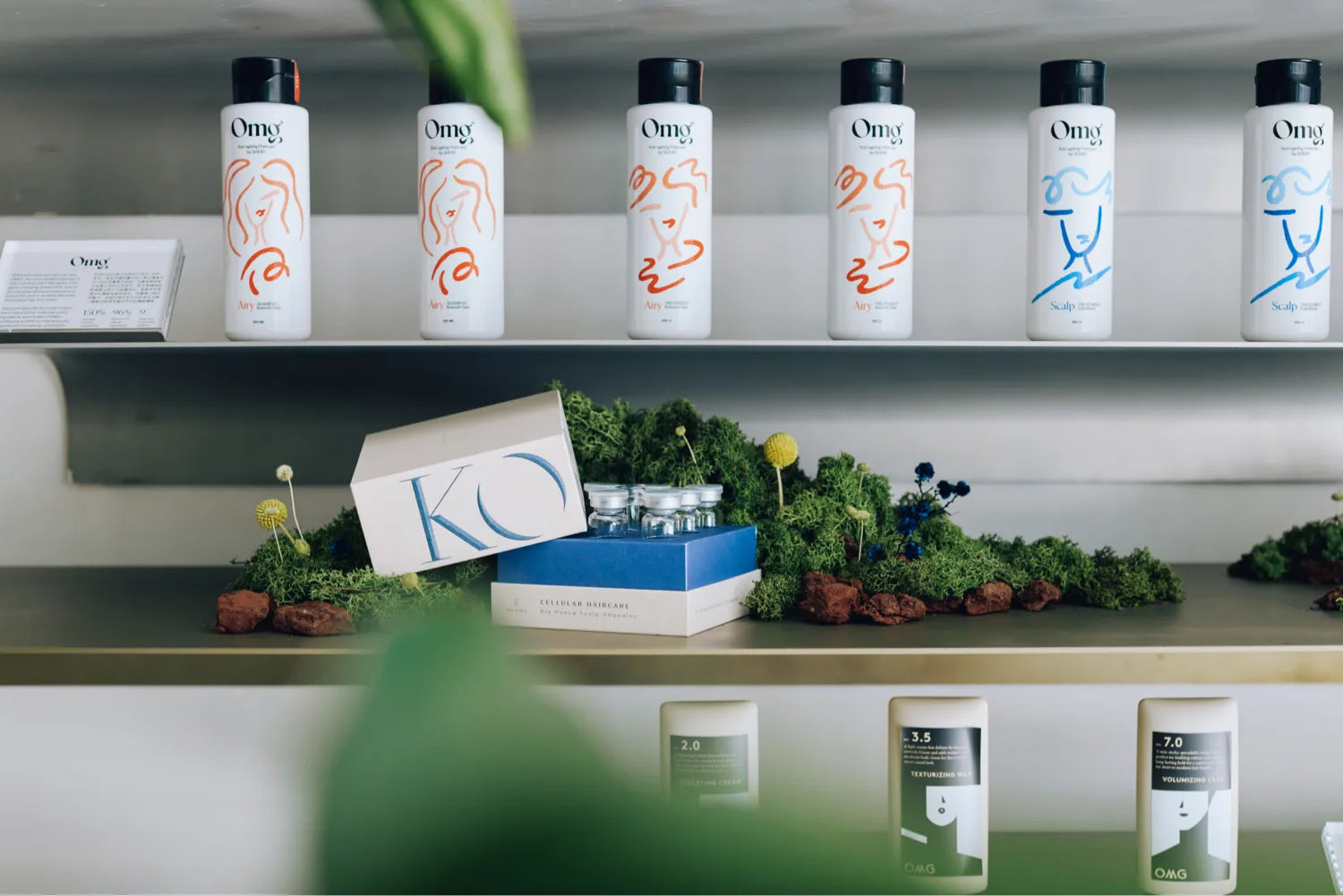 SHHH OMG and KORE haircare products on display